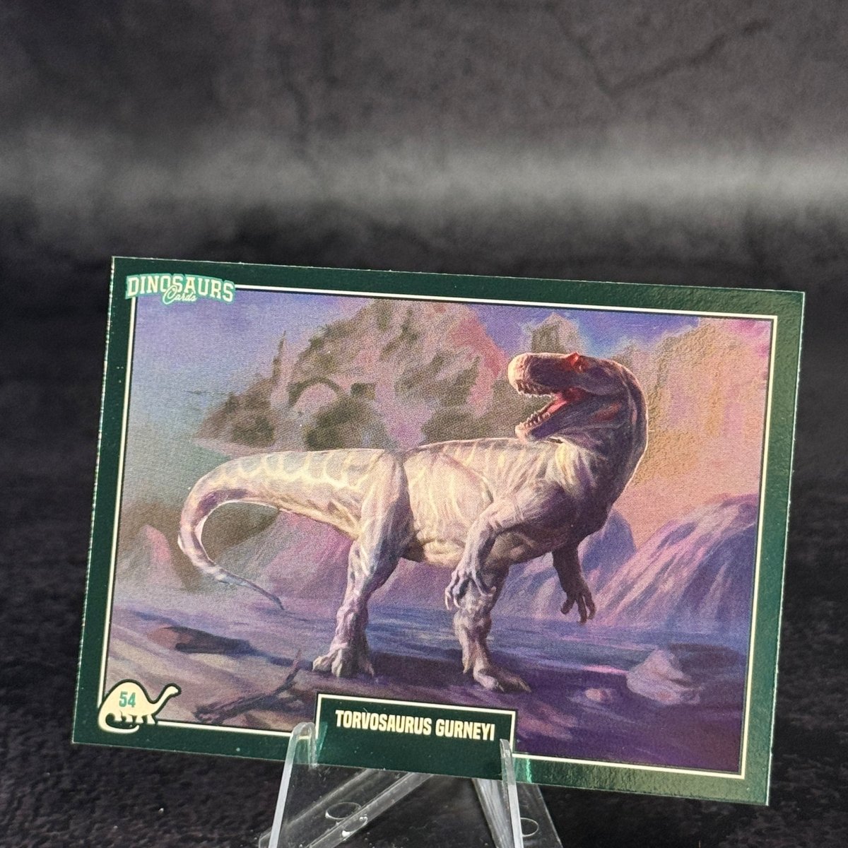 054 | TORVOSAURUS GURNEVI by Julio Reyna | BraccoTCG